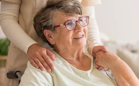 Patient with a retinal detachment is happy after recovering from retina tear treatment at Wolfe Eye Clinic. 